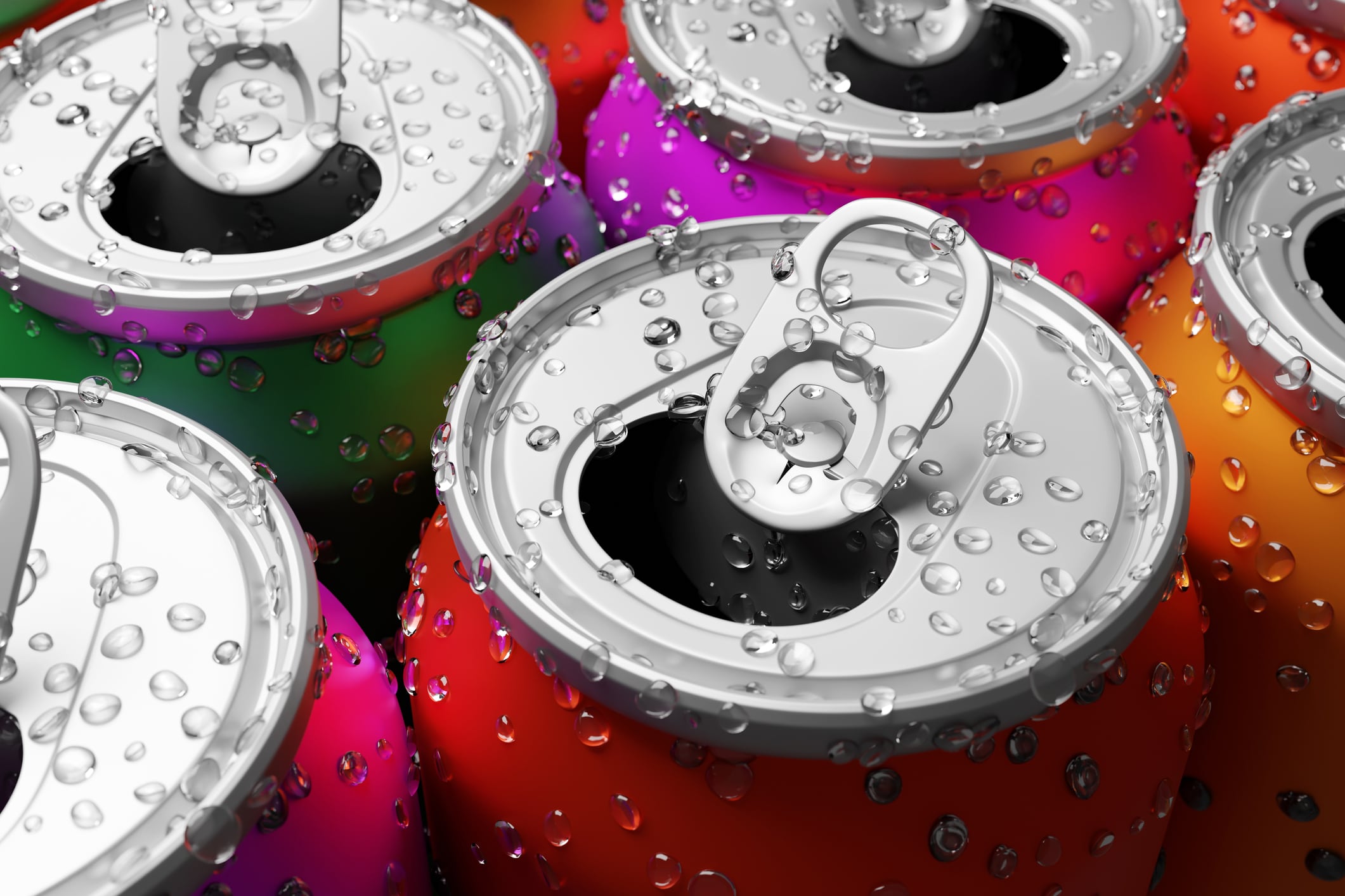 Colorful soda cans covered with condensed water droplets packed closely. Illustration of the concept of soft drinks and sugary fizzy beverages