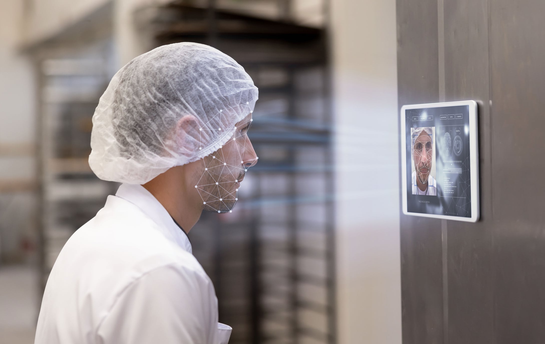 Man scanning his face in a food factory to protect against food fraud