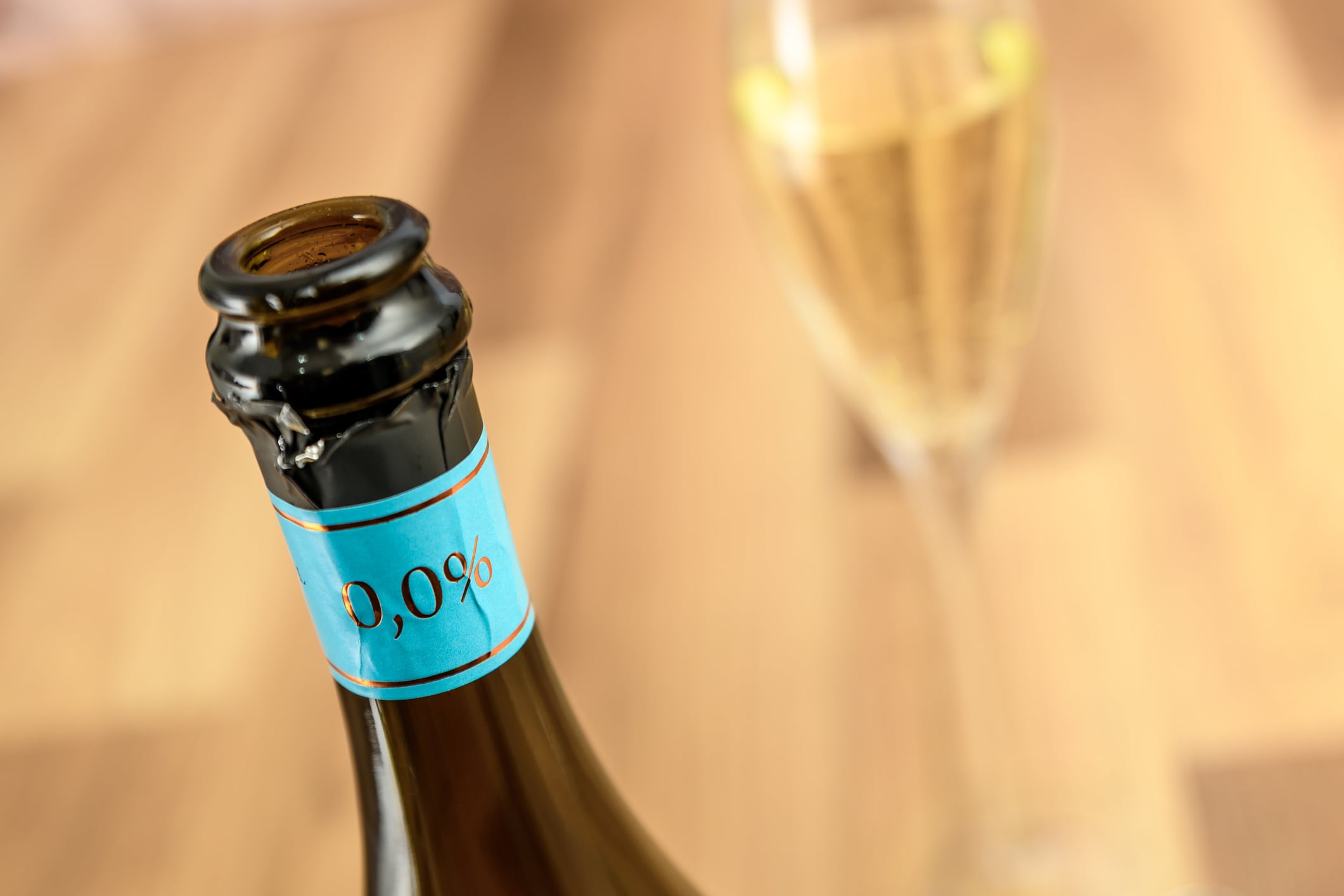 Alcohol free wine bottle and glass of wine