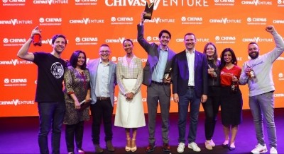  Xilinat CEO and co-founder Javier Larragoiti (center) holds up the Chivas Venture prize. © Getty Images/Dean Mouhtaropoulos