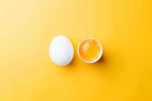 egg and yolk, yellow background, Masanyanka